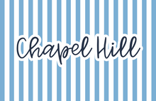 Load image into Gallery viewer, An acrylic serving tray with a blue floral pattern and the text 'NORTH CAROLINA' across the center.