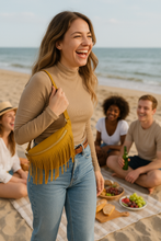 Load image into Gallery viewer, Woman laughing on a beach with friends and a picnic setup