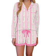 Load image into Gallery viewer, Pink and white striped pajama set with floral patterns on a white background