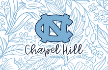 Load image into Gallery viewer, An acrylic serving tray with a blue floral pattern and the text 'NORTH CAROLINA' across the center.
