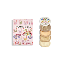 Load image into Gallery viewer, Stack of makeup remover pads with a Thomas &amp; Lee product packaging on a white background
