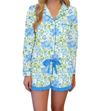 Load image into Gallery viewer, Floral pajama set with blue accents on a white background
