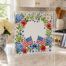 Load image into Gallery viewer, Decorative glass panel with American flags, flowers, and a bow in a kitchen setting.
